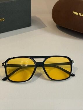 Tom Ford Black Frame Sunglasses with Yellow Lenses and Gold Accents